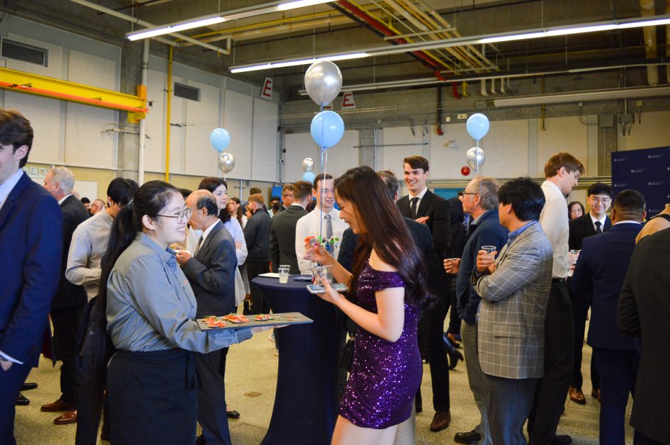 Graduating students and their families celebrate at the 2024 Mechanical Engineering Graduation Reception & Awards Ceremony.