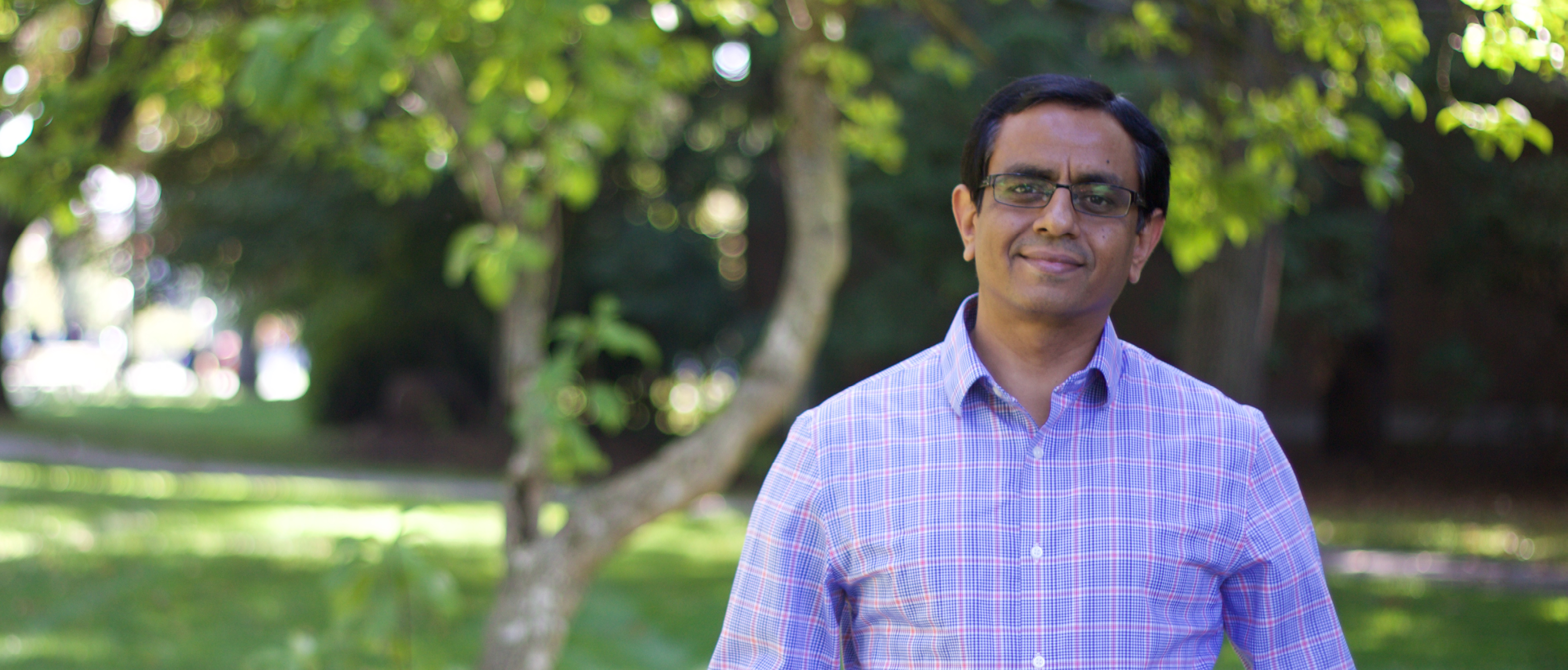 Professor Rajeev Jaiman stands smiling at UBC Vancouver Campus.